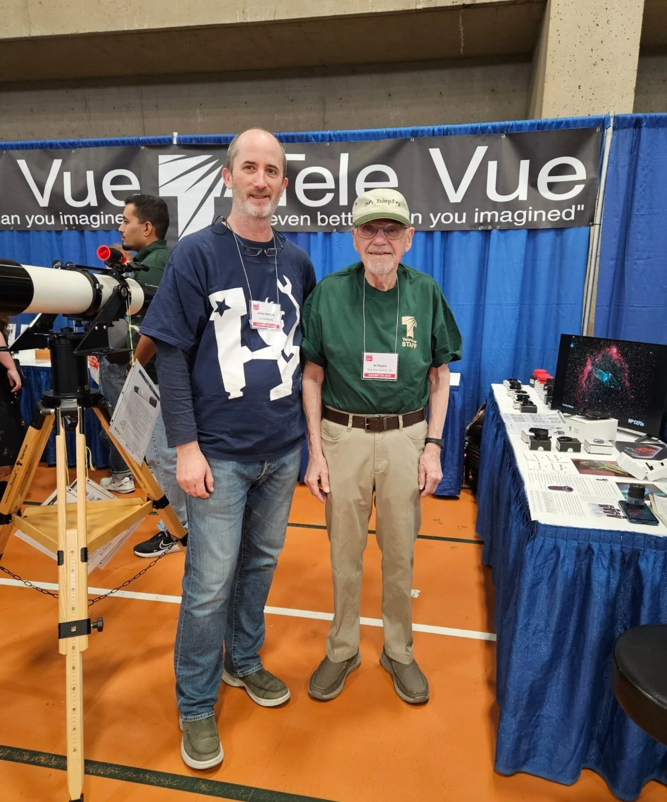 Jaime Alemany of Lunaticoastro standing with Al Nagler of Tele Vue at NEAF 2025, in front of the Tele Vue stand