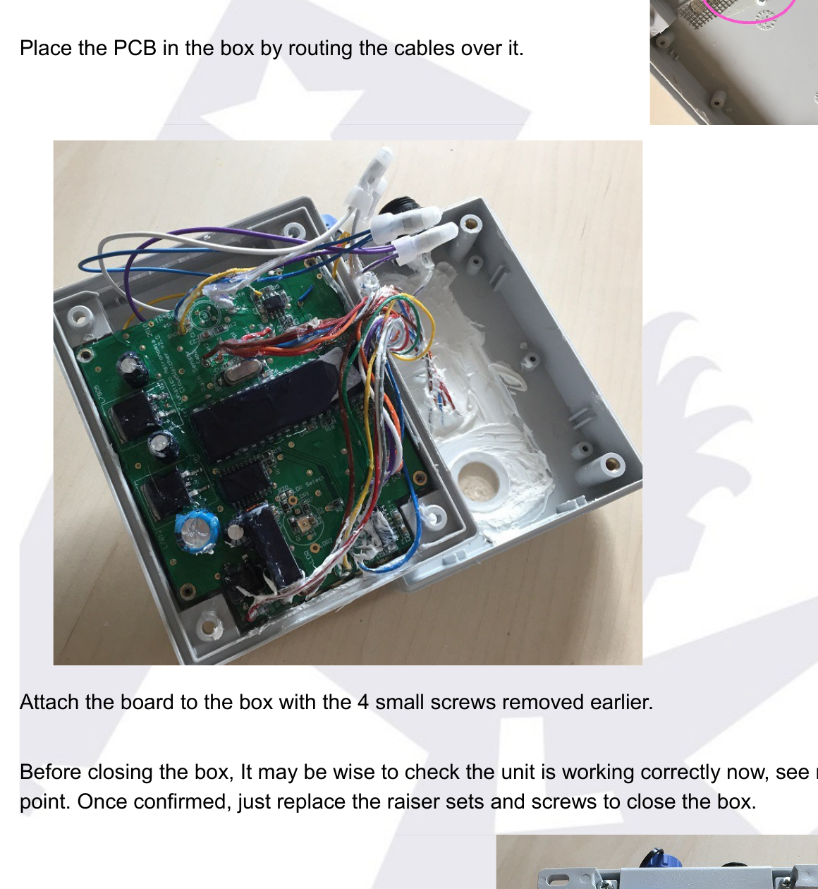 PCB placed back in the box with all cables routed